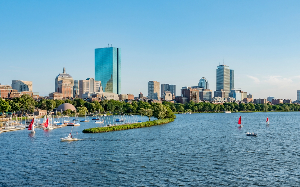 view of the charles river and boston skyline in the background
